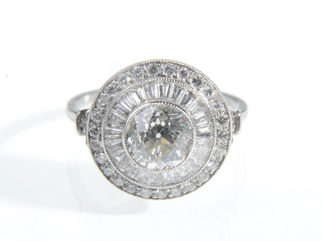 Vintage style diamond target ring in platinum