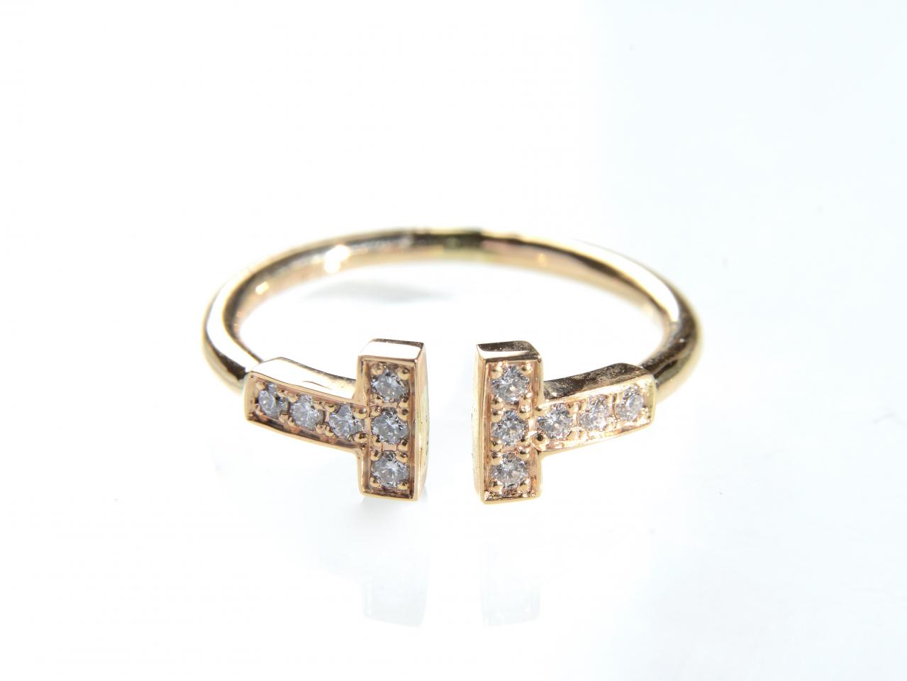 Tiffany & Co. 18kt rose gold and diamond Tiffany T ring