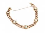 Antique 9kt rose gold and opal curb bracelet with safety chain