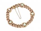 Antique 9kt rose gold and opal curb bracelet with safety chain