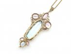 Arts and Crafts aquamarine and pink topaz pendant in yellow gold