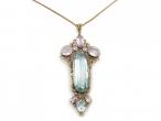 Arts and Crafts aquamarine and pink topaz pendant in yellow gold