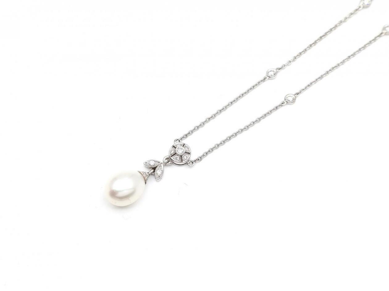 Edwardian style cultured pearl and diamond necklace in white gold