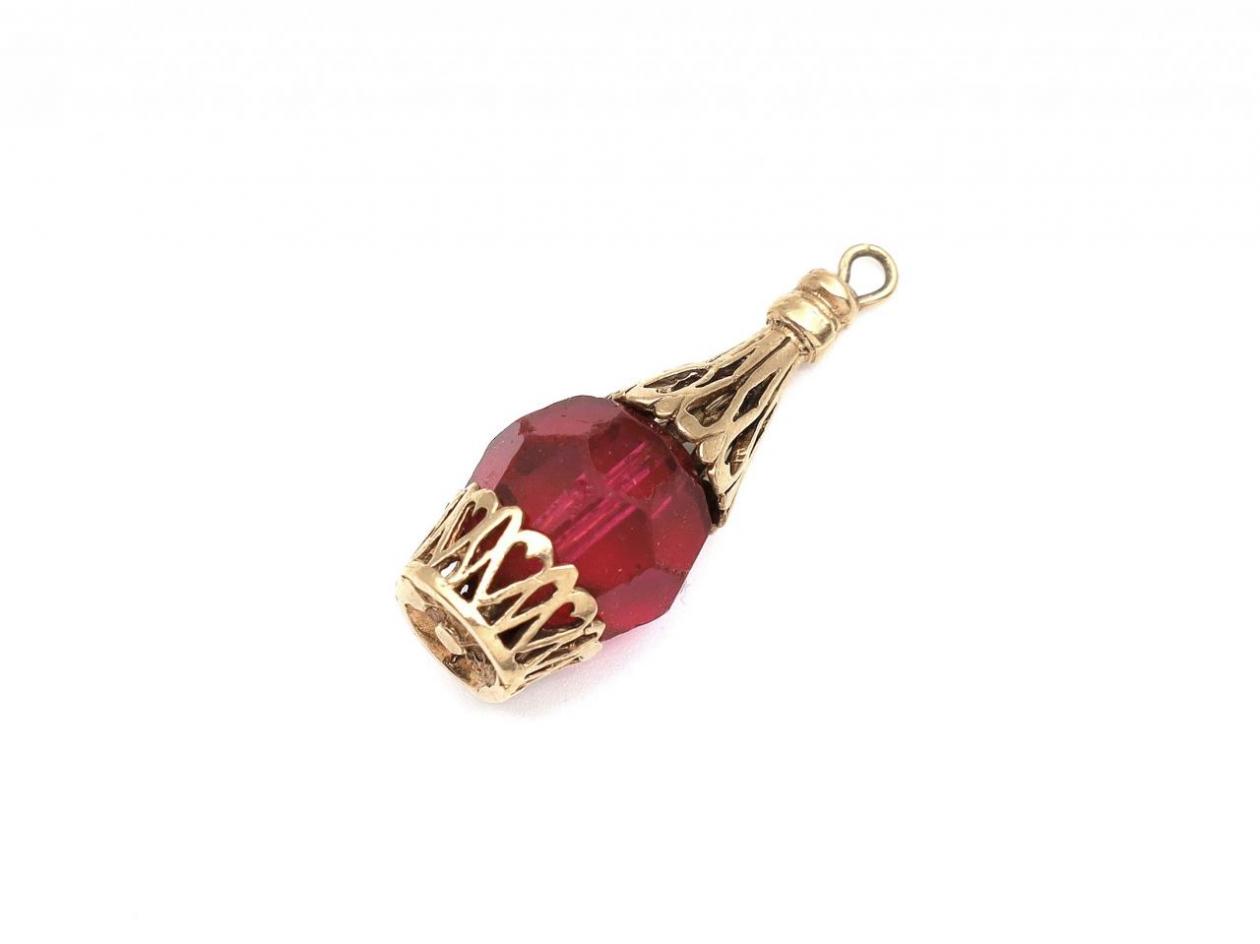 Vintage red faceted glass and 9kt yellow gold scent bottle charm