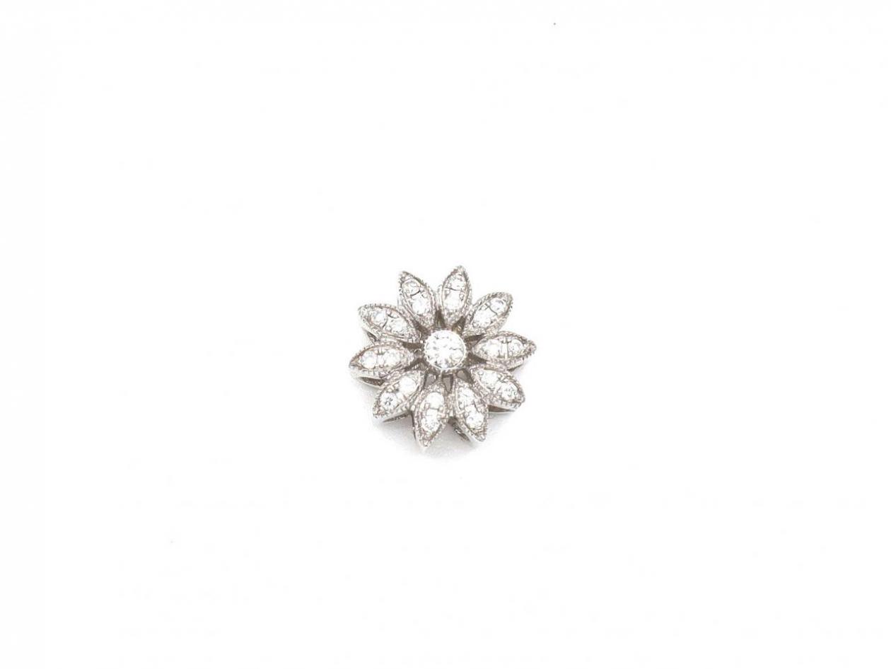 Contemporary 18kt white gold and diamond flower pendant