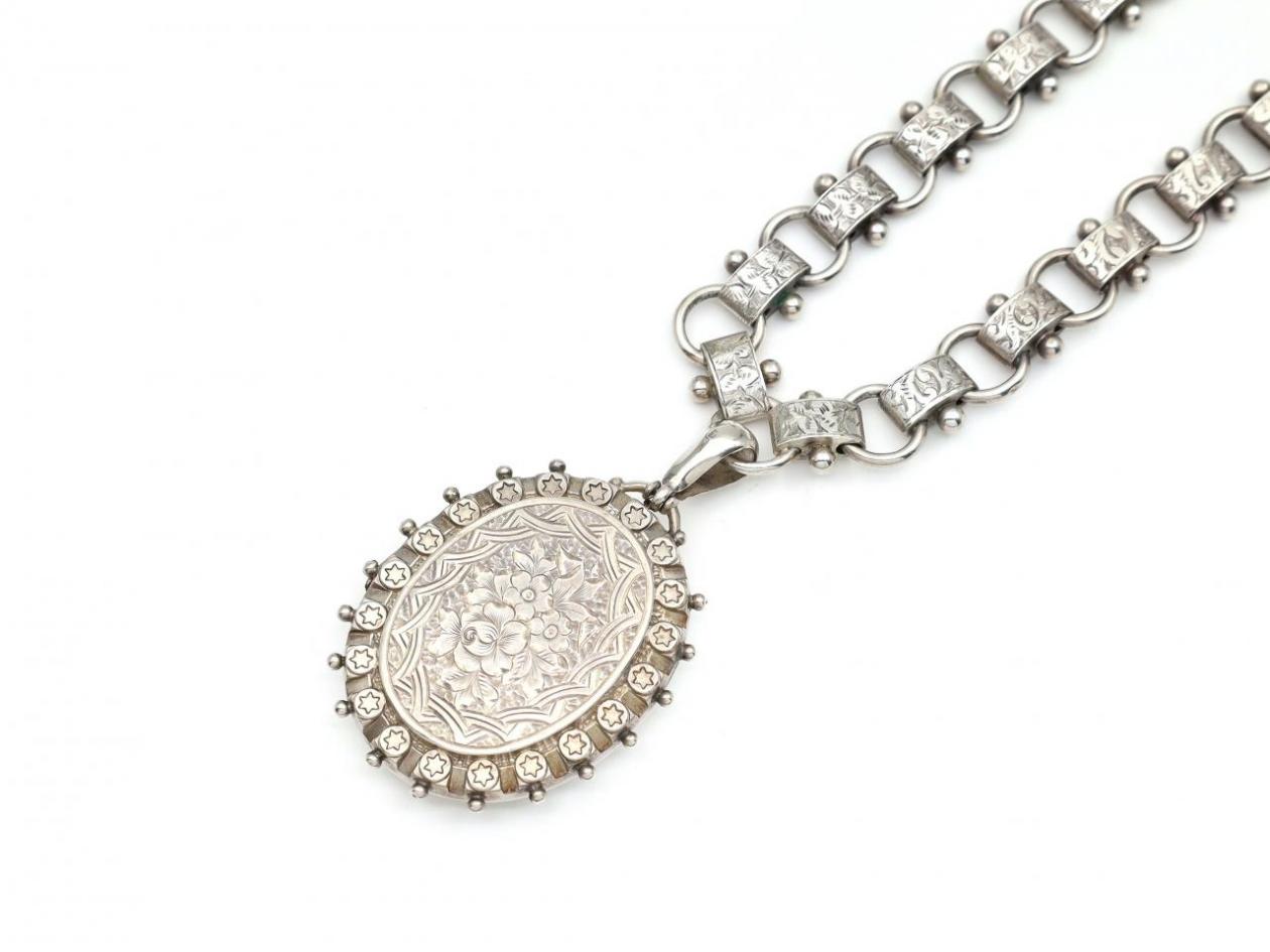Antique sterling silver chain and large elaborate oval locket