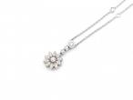 Dainty diamond set flower necklace with spectacle set diamonds