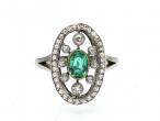 Edwardian emerald and diamond open oval cluster ring