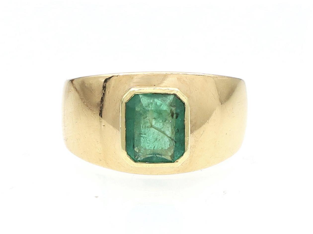 Vintage octagonal emerald cut emerald ring in yellow gold