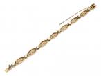 French 18kt yellow gold infinity bracelet set with pearls
