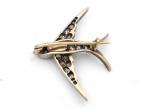 Victorian diamond set swallow bird brooch in silver on gold