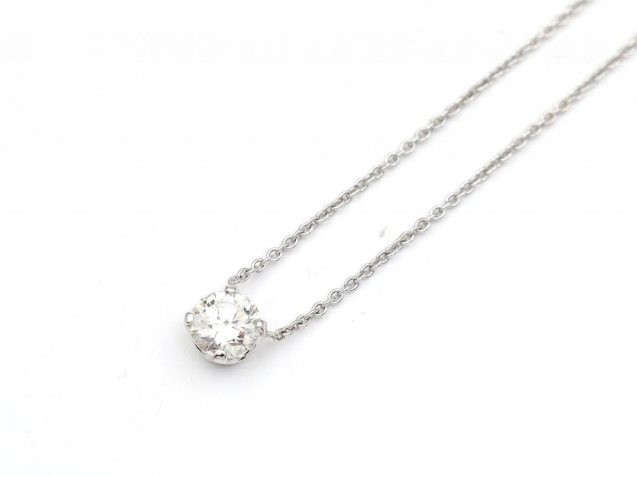 Floating diamond solitaire pendant and chain in white gold