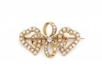 Victorian diamond and seed pearl lover's knot brooch