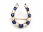 Victorian sapphire and diamond horseshoe brooch