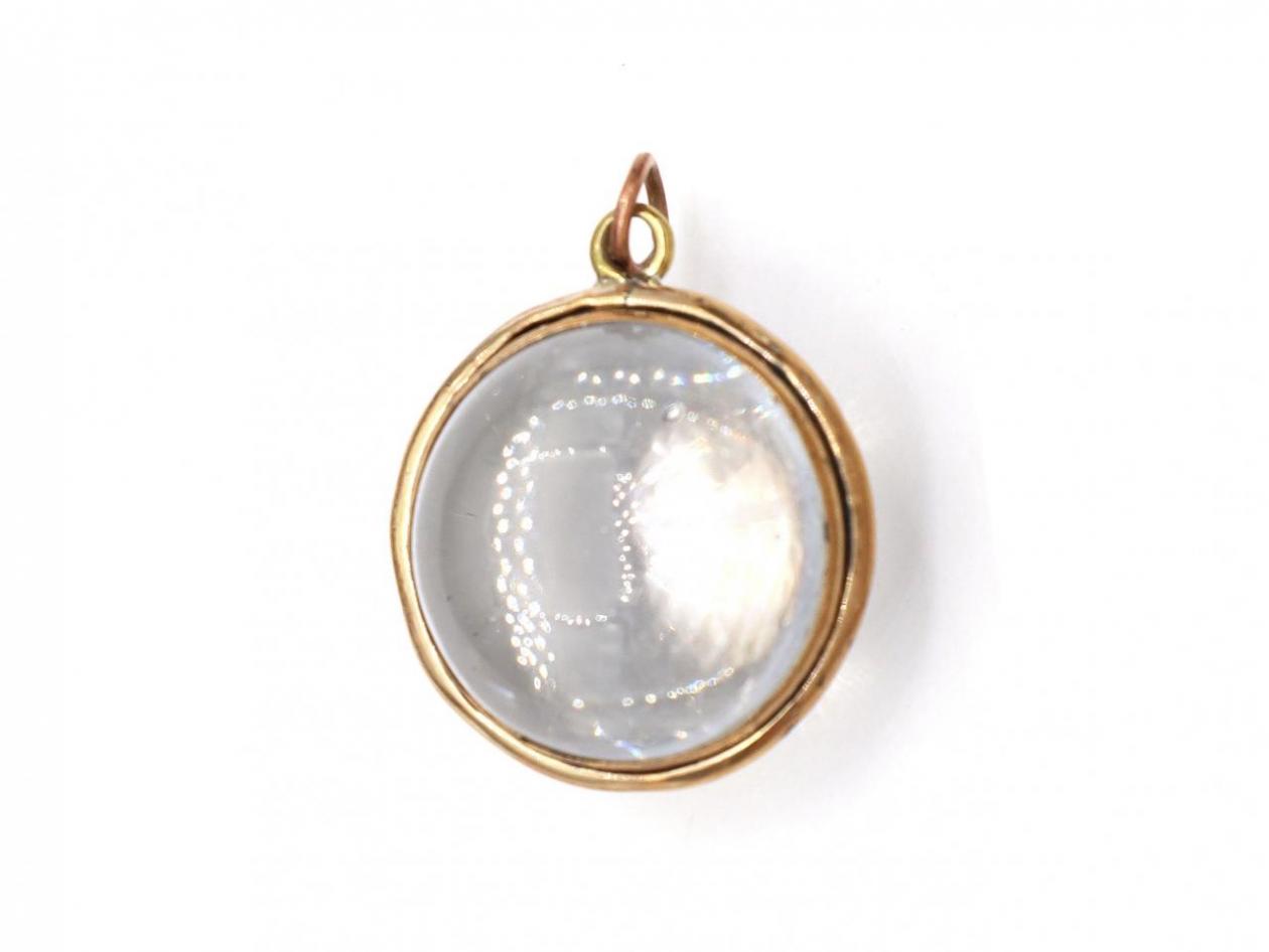 Antique pool of light rock crystal locket