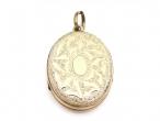 Antique 9kt yellow gold oval family locket