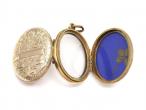 Antique 9kt yellow gold oval family locket