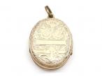 Antique 9kt yellow gold oval family locket