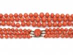 Antique beaded three strand coral necklace with silver clasp