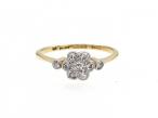 Edwardian flanked diamond daisy cluster ring in platinum and gold