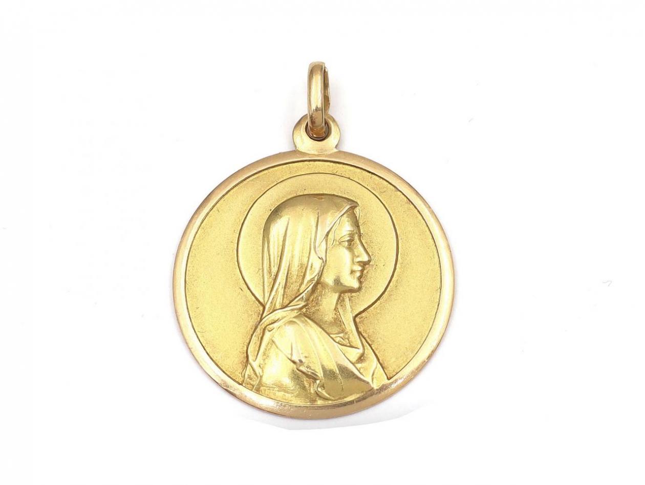 1960s Virgin Mary circular pendant in yellow gold