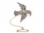 Victorian diamond and ruby dove and olive branch brooch
