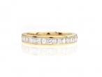 Princess and baguette cut diamond half eternity in 18kt yellow gold