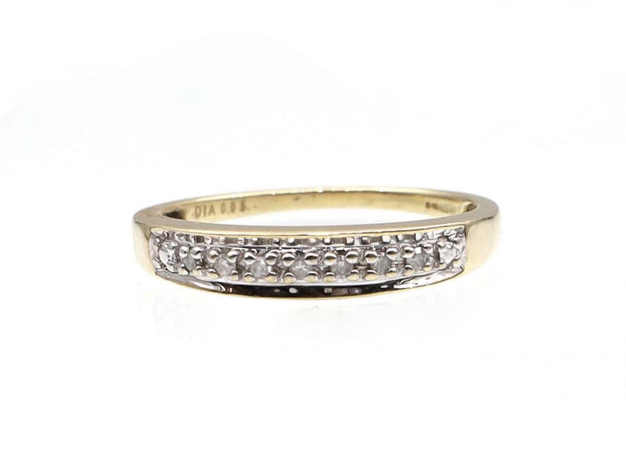 Vintage seven stone diamond band in 9kt yellow gold