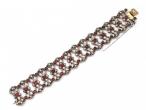 French Art Nouveau silver and gold openwork bracelet set with garnets