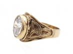 Celtic style signet ring set with an oval cubic zirconia