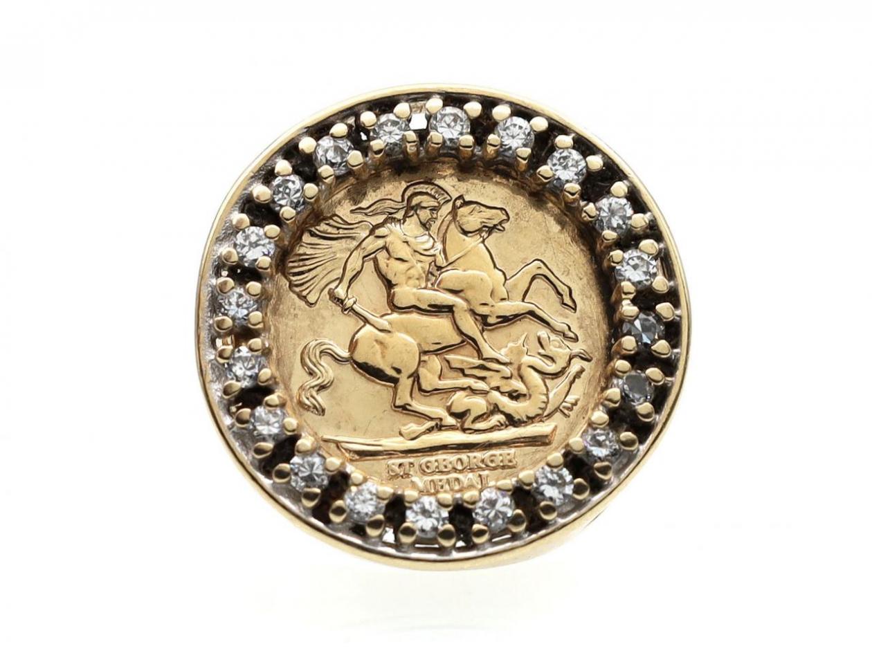 Vintage 9kt yellow gold coin ring with a border of cubic zirconias