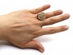Vintage half sovereign ring in a high elaborate 9kt gold setting