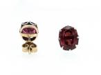Antique oval garnet stud earrings in silver on gold