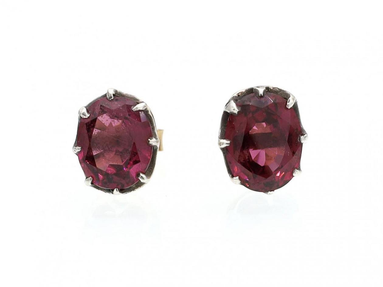 Antique oval garnet stud earrings in silver on gold