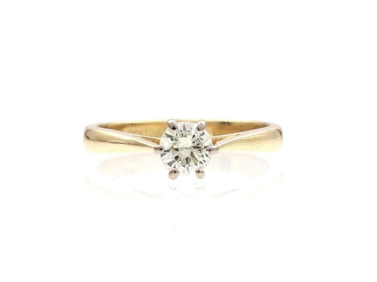 Vintage diamond solitaire engagement ring in 18kt yellow gold