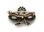 Antique shamrock brooch set with diamonds and demantoid garnets
