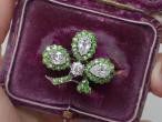 Antique shamrock brooch set with diamonds and demantoid garnets