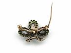 Antique shamrock brooch set with diamonds and demantoid garnets
