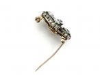 Antique shamrock brooch set with diamonds and demantoid garnets