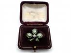 Antique shamrock brooch set with diamonds and demantoid garnets