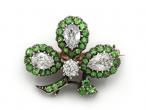 Antique shamrock brooch set with diamonds and demantoid garnets