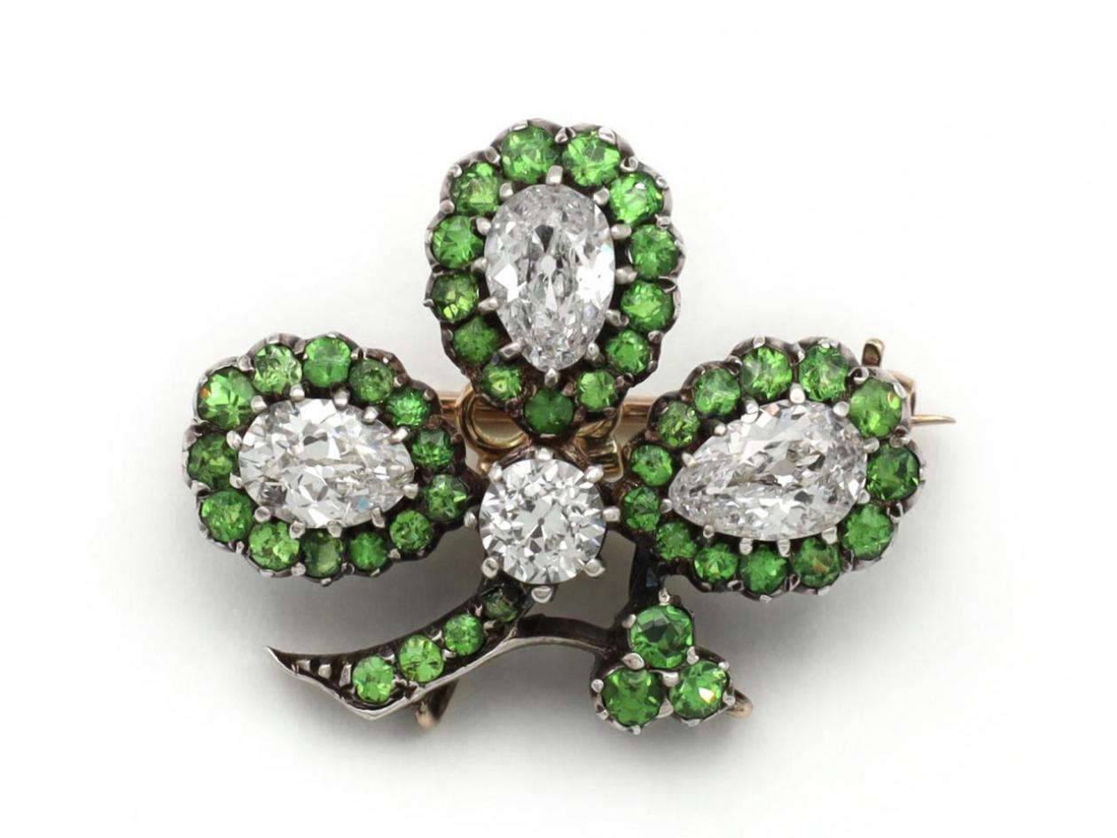 Antique shamrock brooch set with diamonds and demantoid garnets