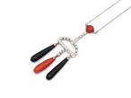 Art Deco style coral, onyx and diamond drop pendant in 18kt white gold