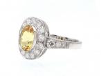 Vintage style oval yellow sapphire and diamond cluster ring