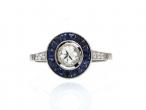 Diamond and sapphire target ring in platinum