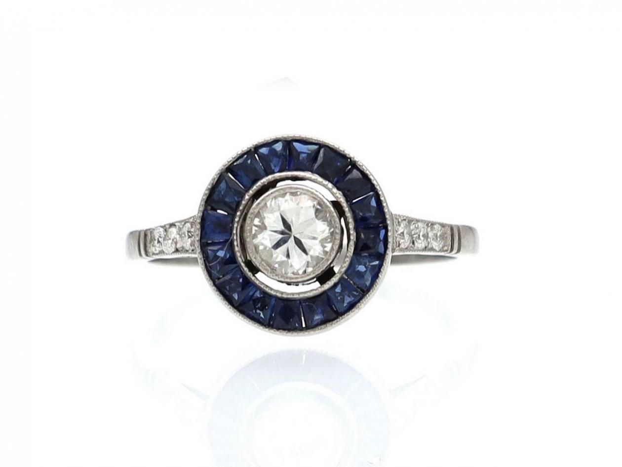 Diamond and sapphire target ring in platinum