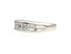 Seven stone square step cut diamond ring in platinum