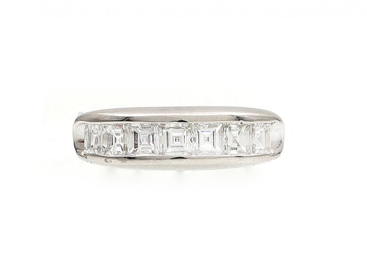 Seven stone square step cut diamond ring in platinum