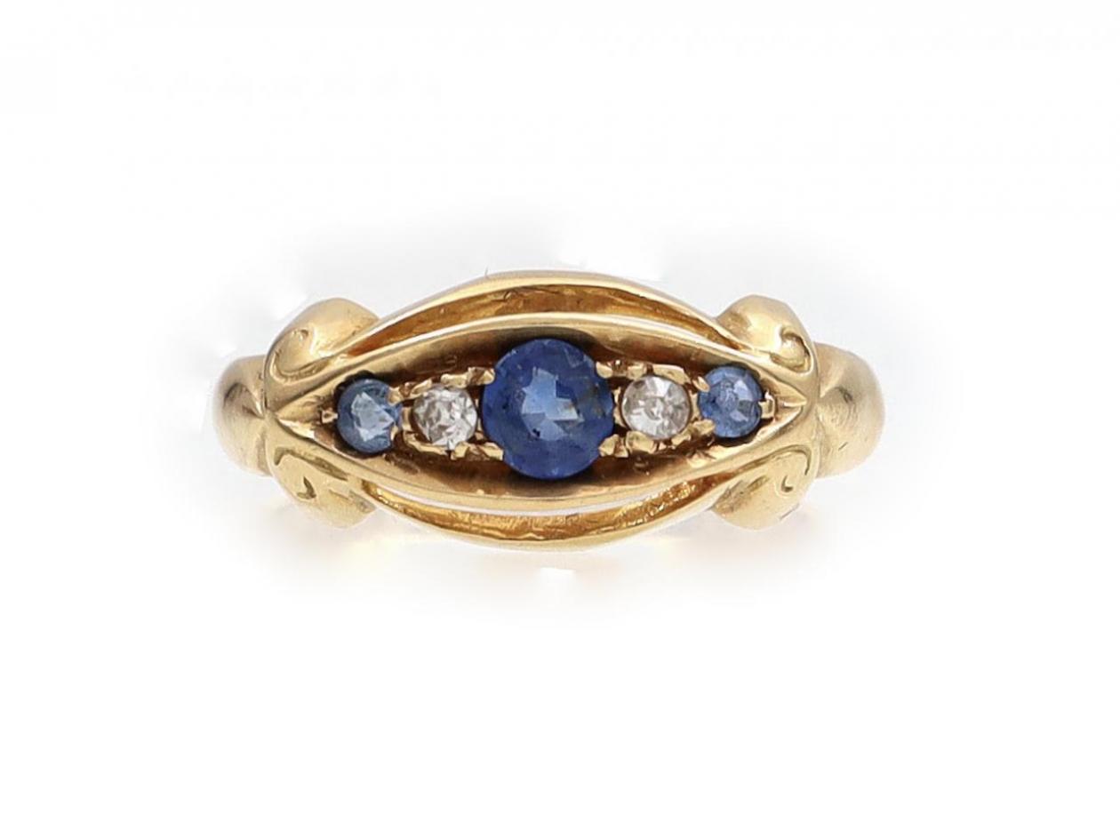 Antique sapphire and diamond open scroll ring