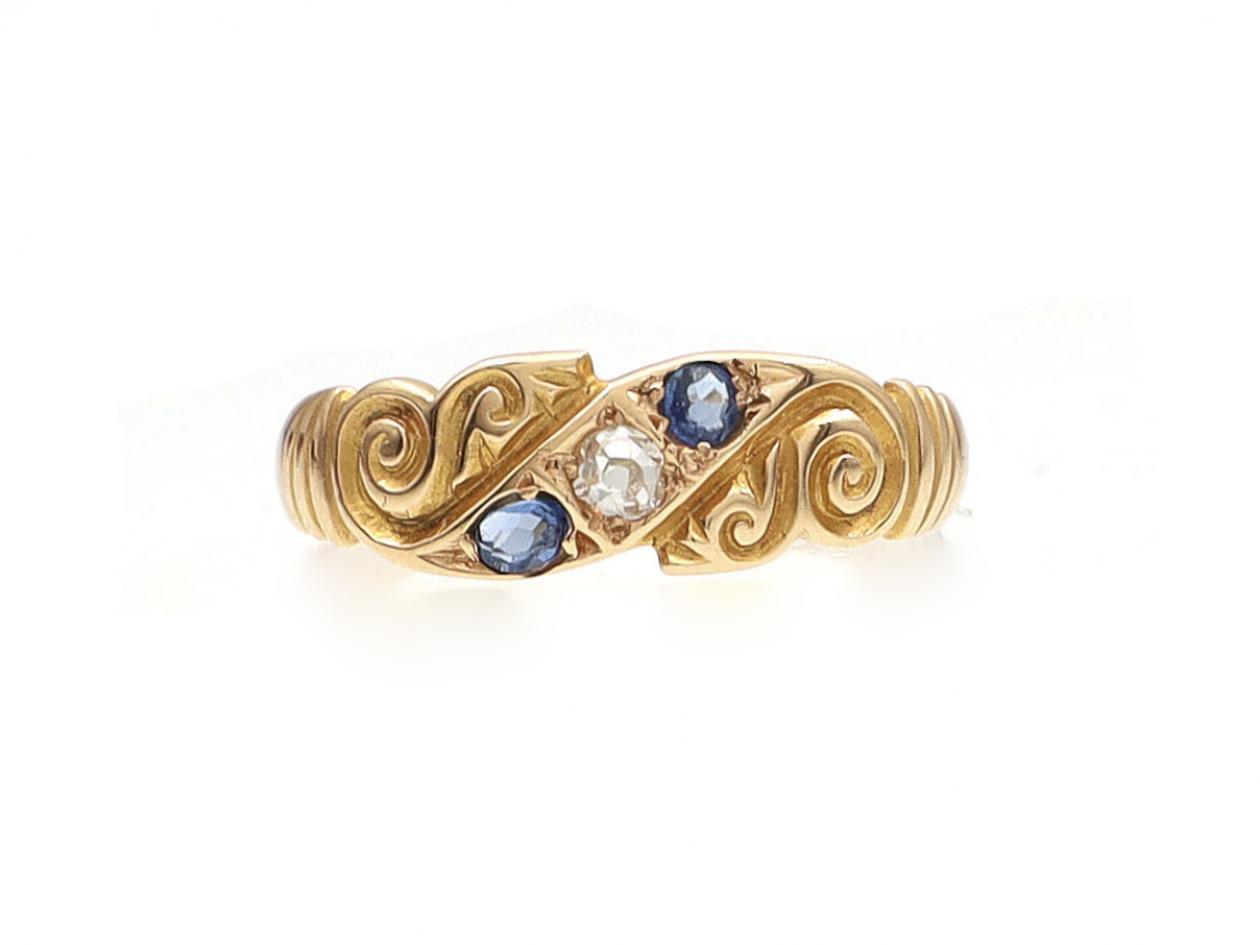 Victorian diamond and sapphire diagonal three stone ring